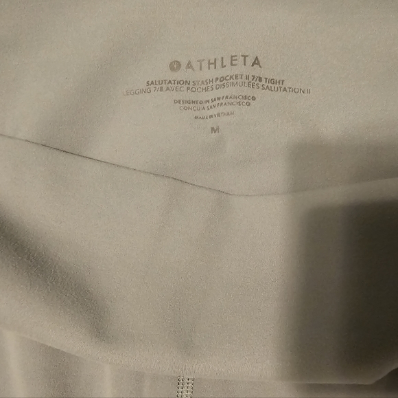Athleta Salutation Stash Pocket 7/8 Tight - Picture 3 of 3